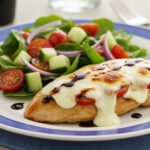 Delicious final dish of Balsamic Baked Chicken Breast with Mozzarella Cheese, beautifully plated.