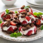 A stunning display of Chocolate Strawberry Yogurt Clusters on a beautiful plate, showcasing the perfect dessert for chocolate and strawberry lovers.