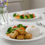 Delicious Crispy Honey Garlic Tofu dish plated elegantly, capturing a mouthwatering presentation perfect for mealtime.