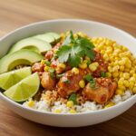 Final presentation of a delicious street corn chicken rice bowl with vibrant colors and textures, perfect for enjoying.