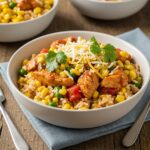 Final presentation of Easy Mexican Street Corn Chicken Bowl, featuring colorful and fresh ingredients in a deliciously arranged dish.