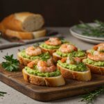 Beautifully arranged garlic shrimp crostini with avocado, showcasing a flavorful bite-sized delight ideal for appetizers at any gathering.