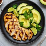 Perfectly plated Grilled California Avocado Chicken, visually appealing with vibrant colors, presenting an easy chicken recipe that's delicious and healthy.