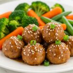 Delicious honey garlic turkey meatballs on a plate, perfect for a healthy and flavorful meal.
