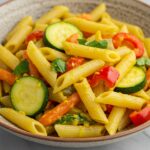 Delicious and colorful One-Pot Summer Veg Pasta presented in a bowl, highlighting its freshness and mouthwatering appeal.