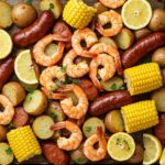 Beautifully plated Sheet-Pan Shrimp Boil featuring succulent shrimp, sausage, corn, and potatoes, perfect for a family meal.