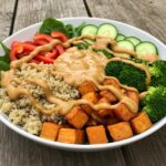 Final presentation of the Thai Peanut Sweet Potato Buddha Bowl, highlighting colorful ingredients packed with nutrition and flavor for a healthy lunch or dinner.